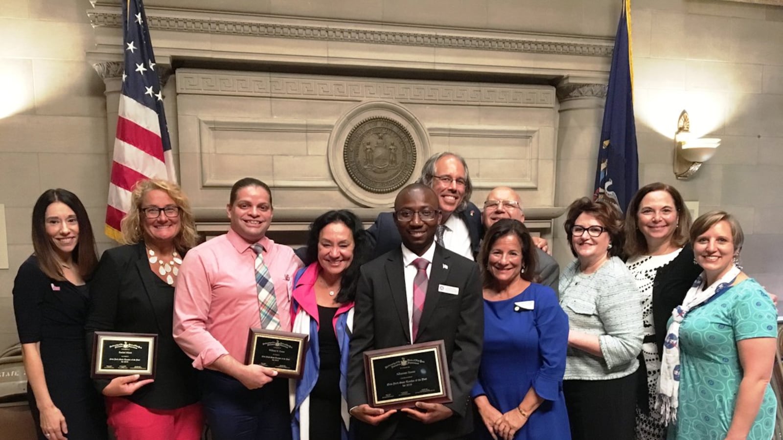 Bronx International High School teacher Alhassan Susso, center, is New York State's 2019 Teacher of the Year.