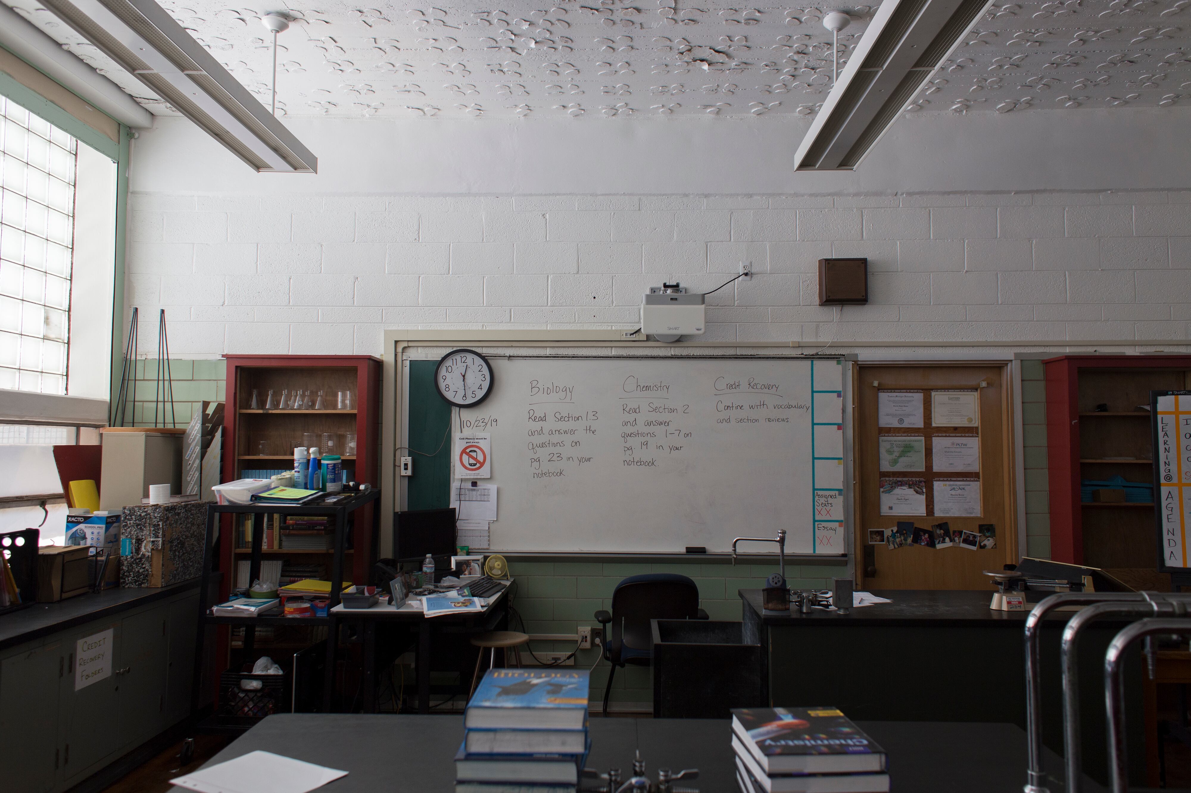 A school building with broken ceiling tiles.