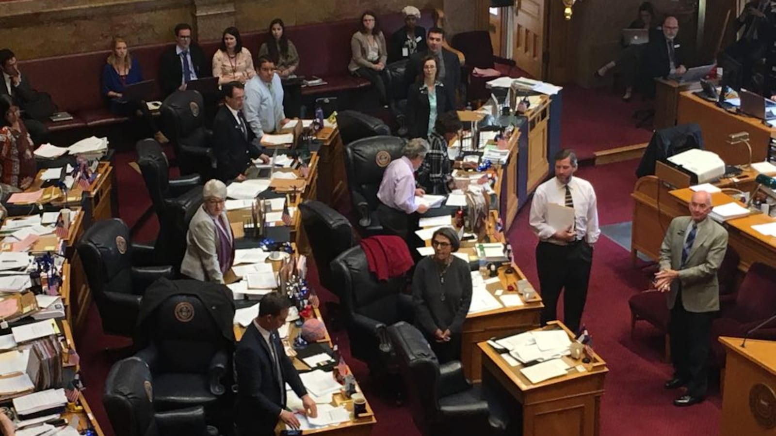 Colorado Senate Democrats stand to vote no on a budget amendment to add $35 million for school security. (Erica Meltzer/Chalkbeat)
