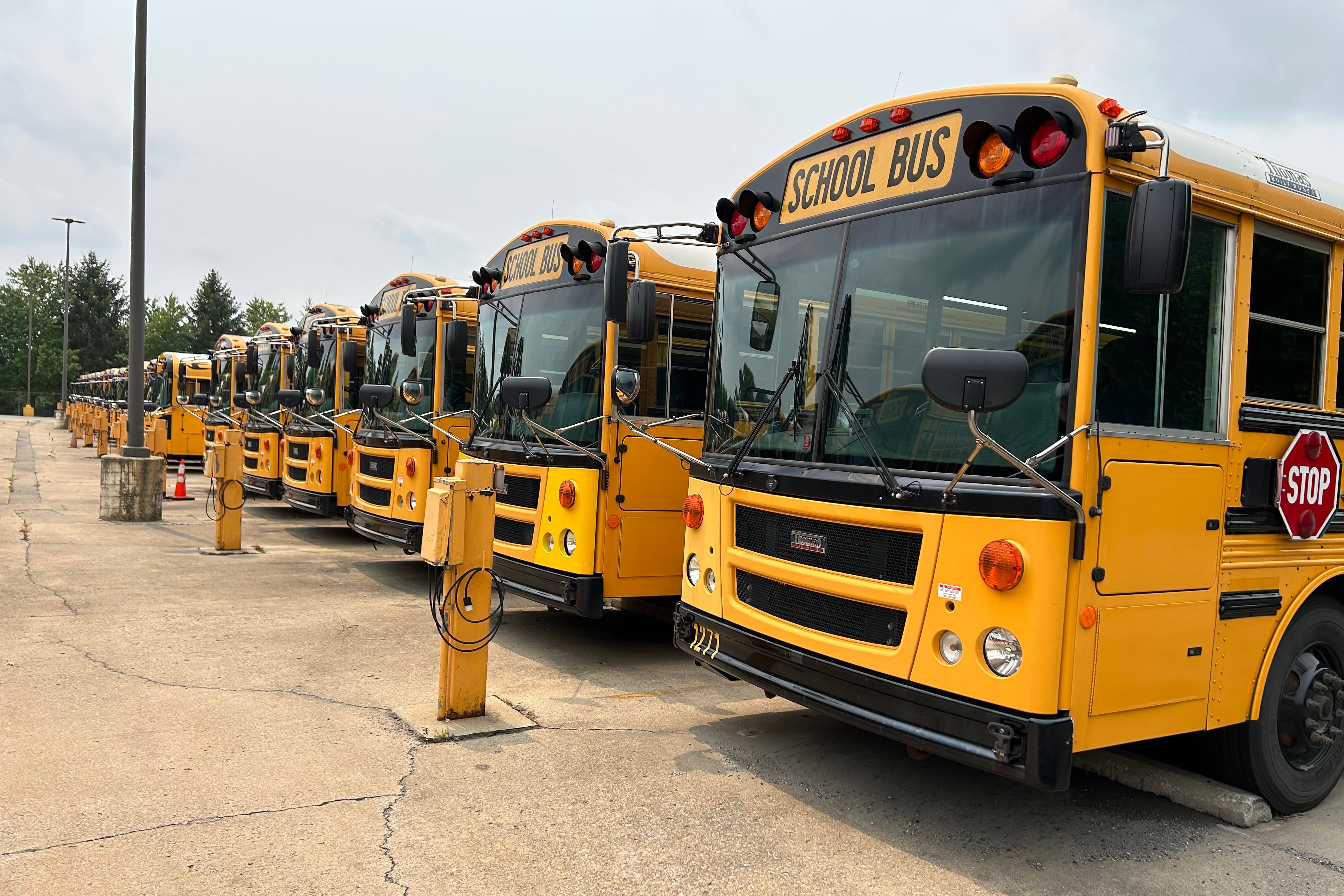 School buses in Perry Township Schools bus yard on July 17, 2023.