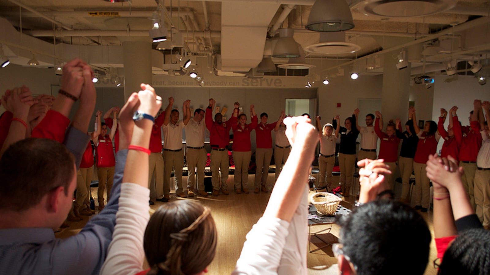 City Year volunteers participate in a group training as part of their preparation for working with students in urban, high-poverty communities.