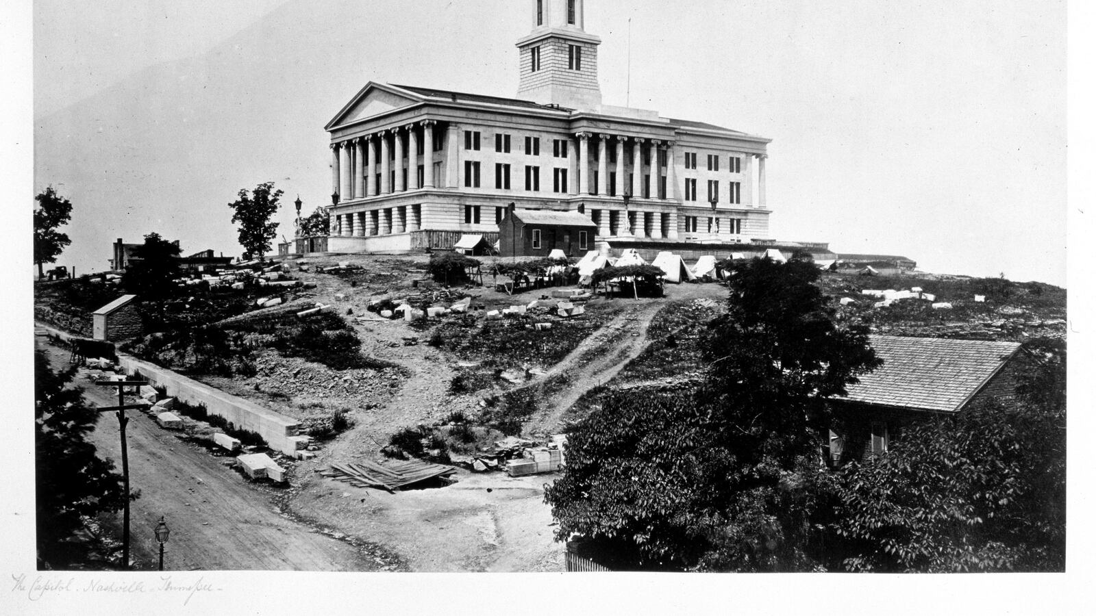 A historic black and white photograph of the Tennessee State Capitol in Nashville during the Civil War.