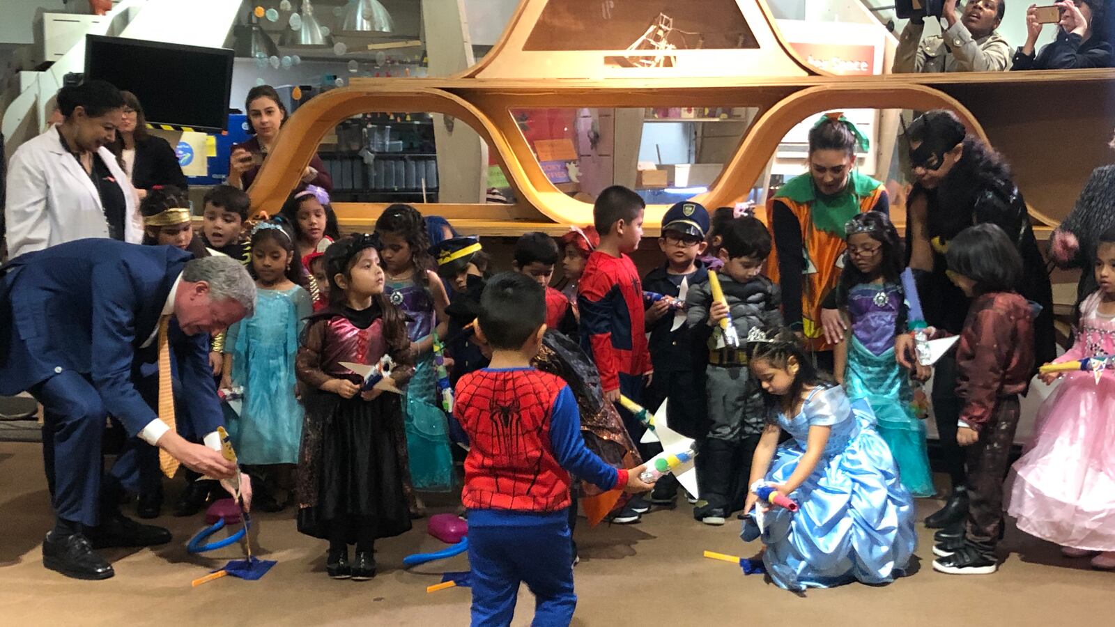 Pre-K students from Corona join Mayor Bill de Blasio at a Oct. 31, 2019, groundbreaking ceremony for a STEAM-focused pre-K to open September 2021.