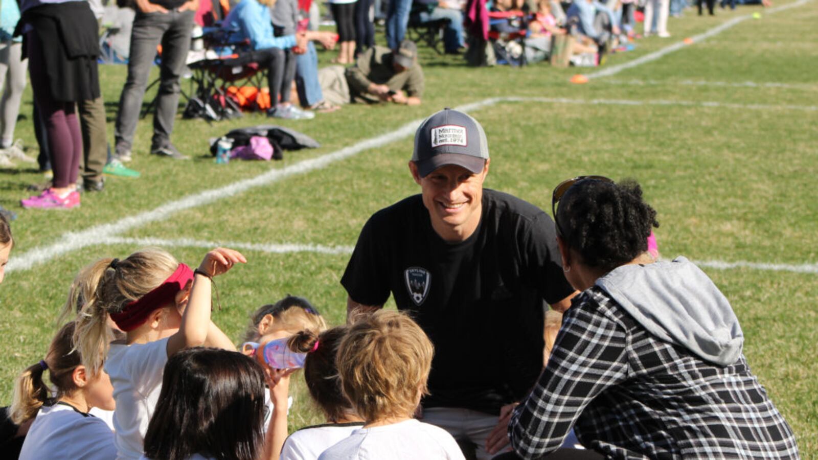 Scott Baldermann coaches his daughter's soccer team.