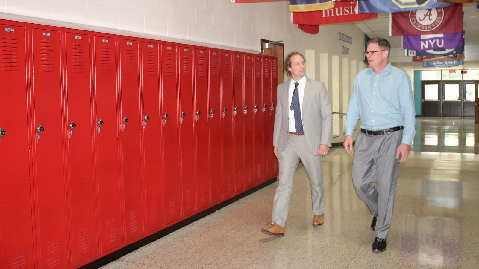 Principal Gary Hughes (right) talks with his supervisor, Craig Hammond, at Nashville's J.T. Moore Middle School. Hammond spends a half day every other week working collaboratively with Hughes under an emerging administrative support and coaching model used by Metropolitan Nashville Public Schools.