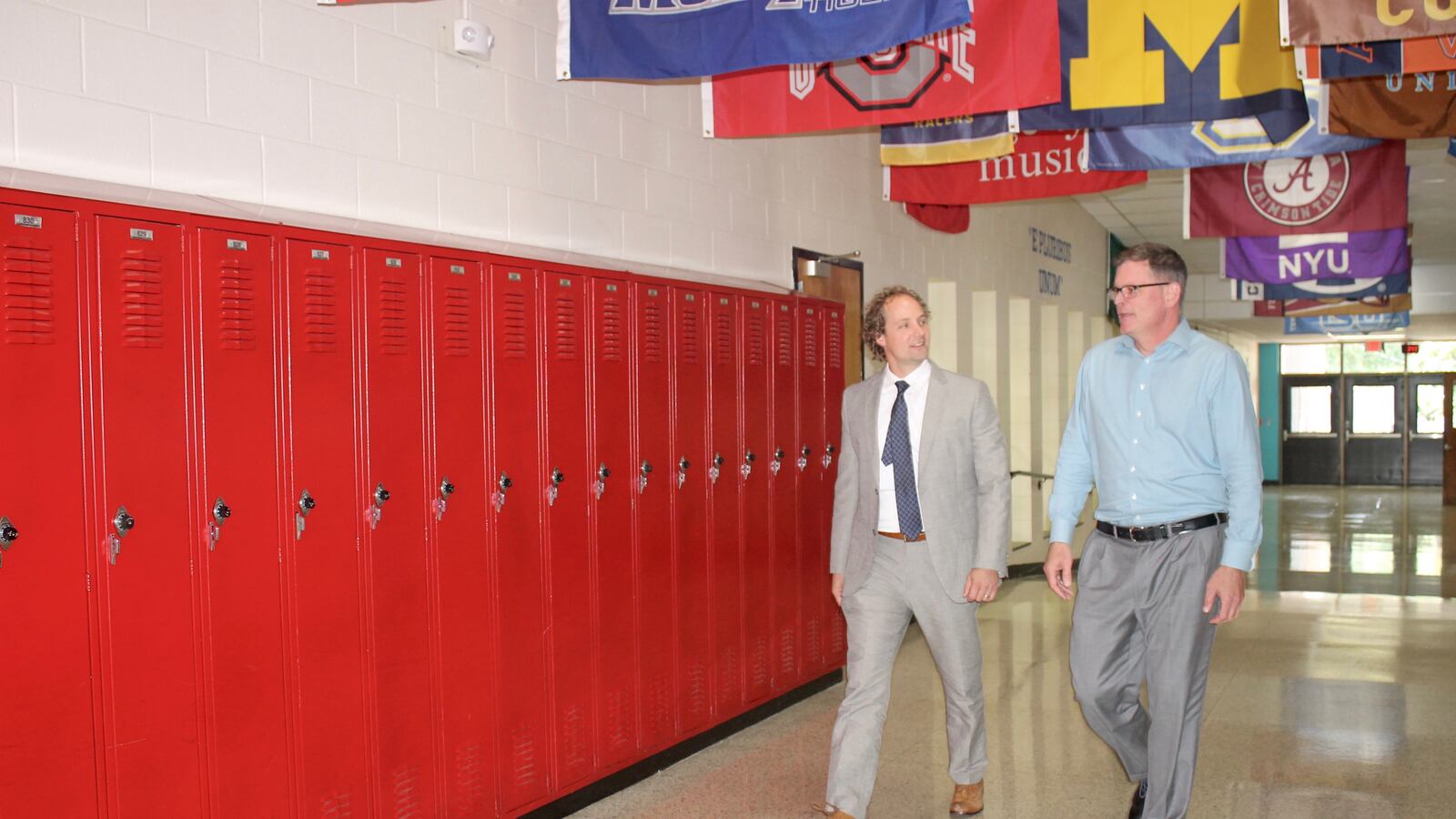 Principal Gary Hughes (right) talks with his supervisor, Craig Hammond, at Nashville's J.T. Moore Middle School. Hammond spends a half day every other week working collaboratively with Hughes under an emerging administrative support and coaching model used by Metropolitan Nashville Public Schools.