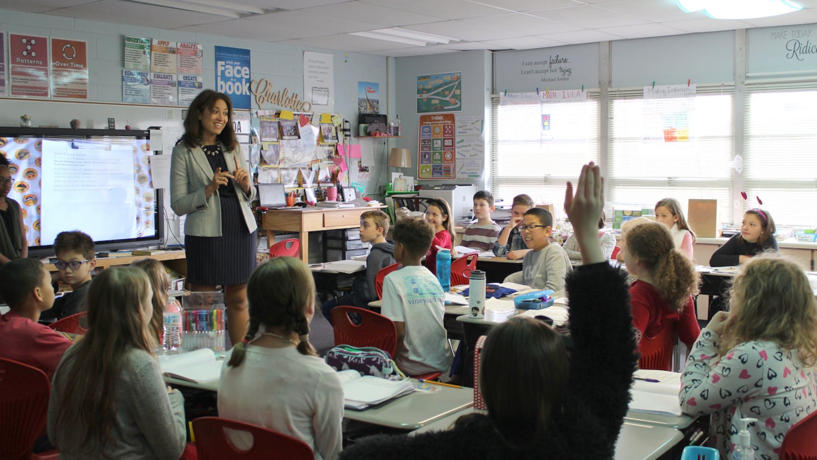 Penny Schwinn talks with students in Rutherford County at one of more than 175 classrooms she's visited since starting as Tennessee's education commissioner in February. (Photo courtesy of the Tennessee Department of Education)