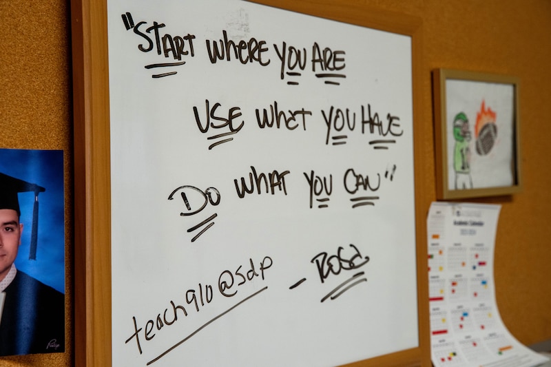 A quote displayed on a whiteboard reads, "Start where you are use what you have do what you can. - Rosa."