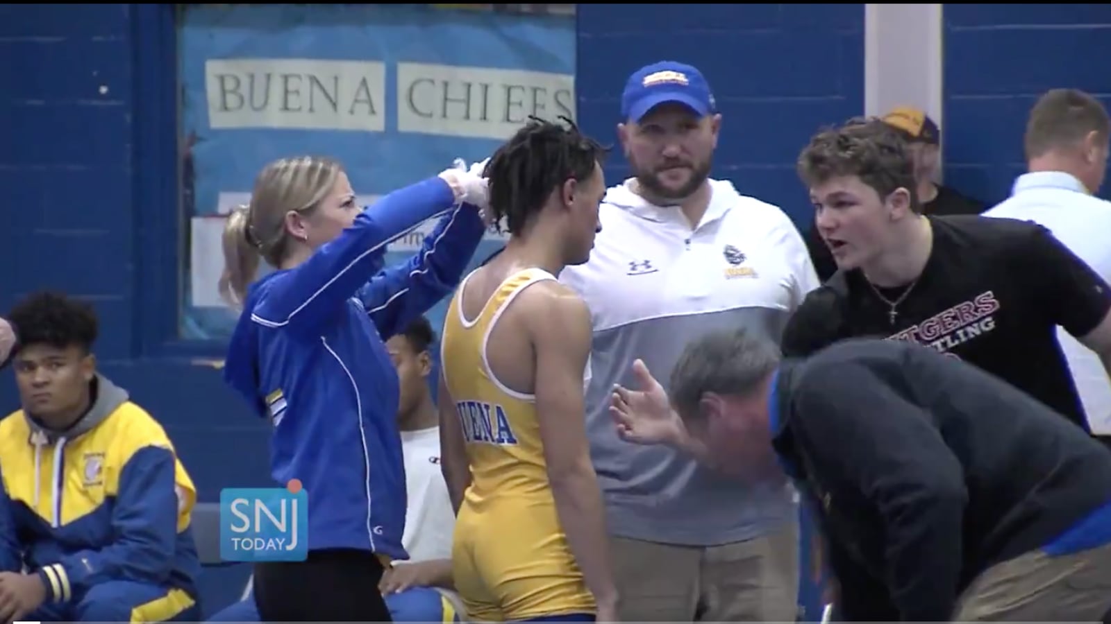A video of a black high school wrestler being forced to cut his hair to continue competing went viral.