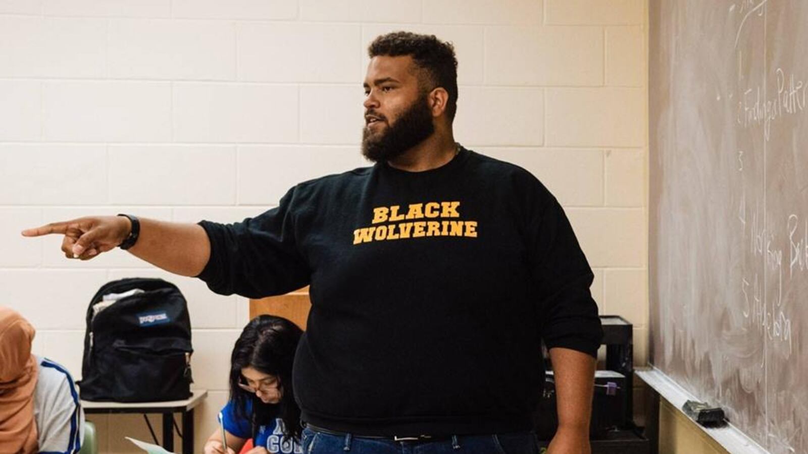 Michael Chrzan teaching math during Math Corps, a summer program at Wayne State University.