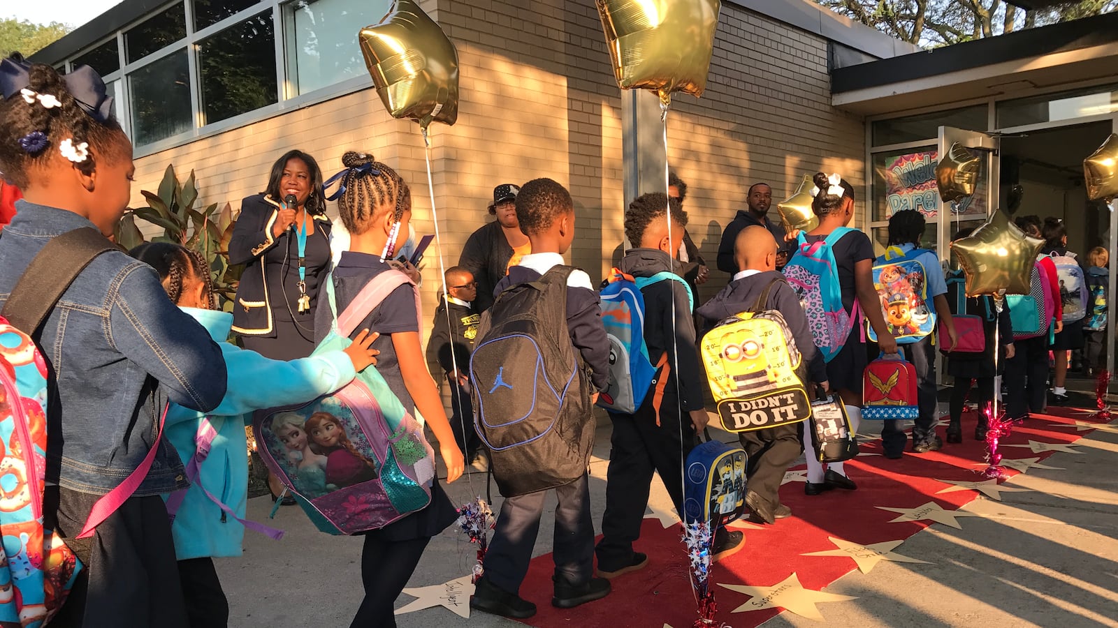 Not all district schools faced challenges on the first day. Students at Detroit's Chrysler elementary school walked the red carpet the school set up for the first day of school.