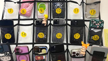 Will a new cellphone policy for Michigan students go into effect before school starts?