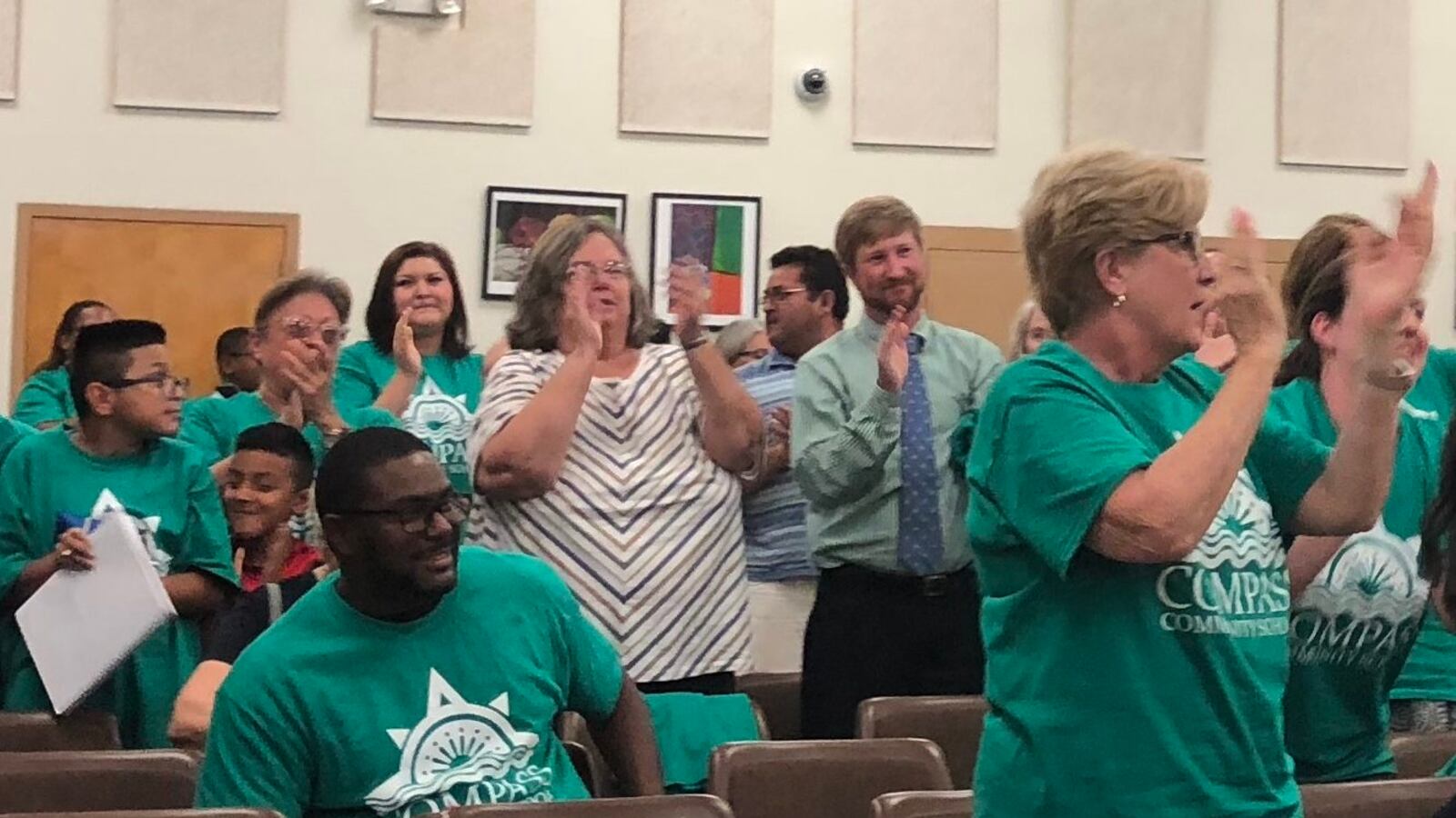 Supporters of New Day Schools, which plans to open six schools in the buildings currently used by Jubilee Catholic Schools Network, applaud the decision of Shelby County Schools board.