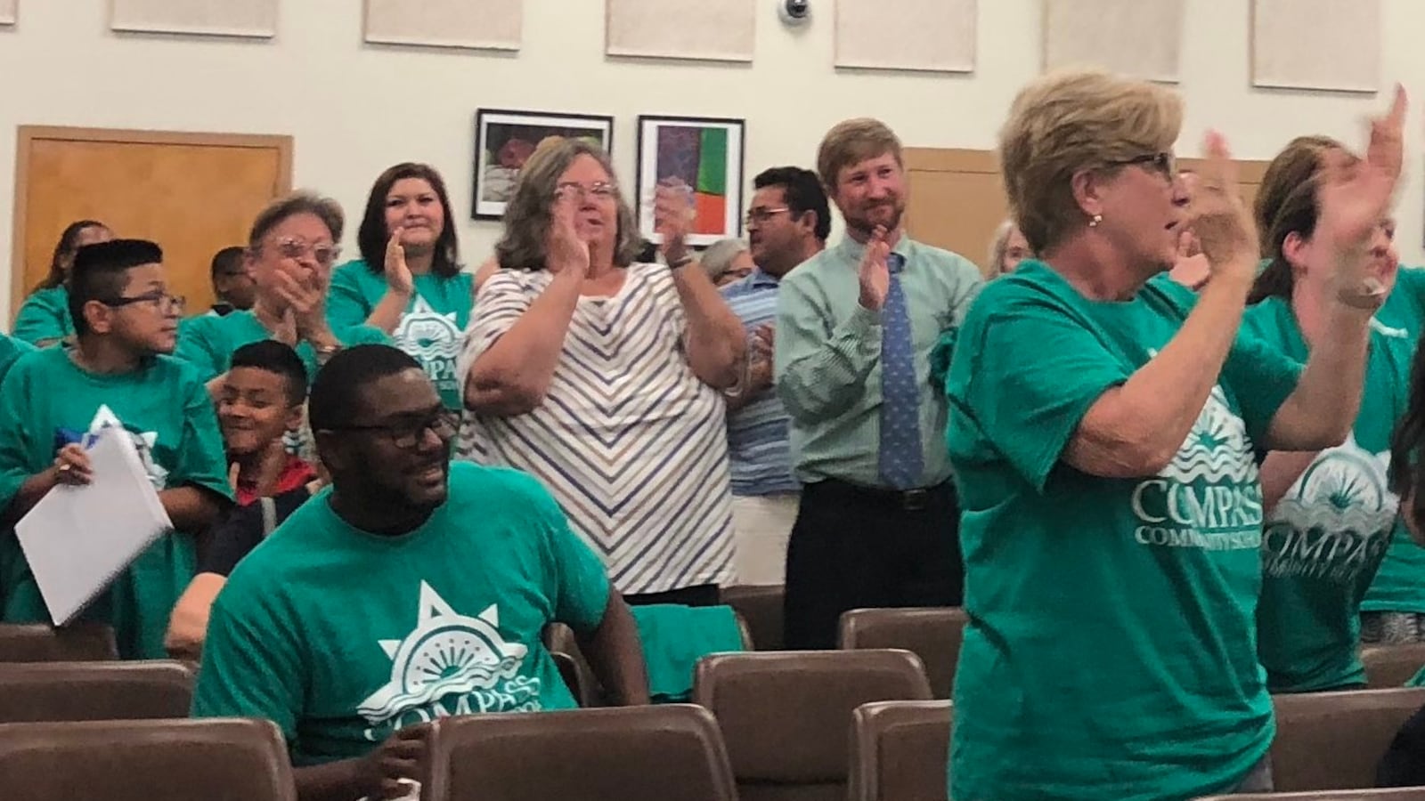 Supporters of New Day Schools, which plans to open six schools in the buildings currently used by Jubilee Catholic Schools Network, applaud the decision of Shelby County Schools board.