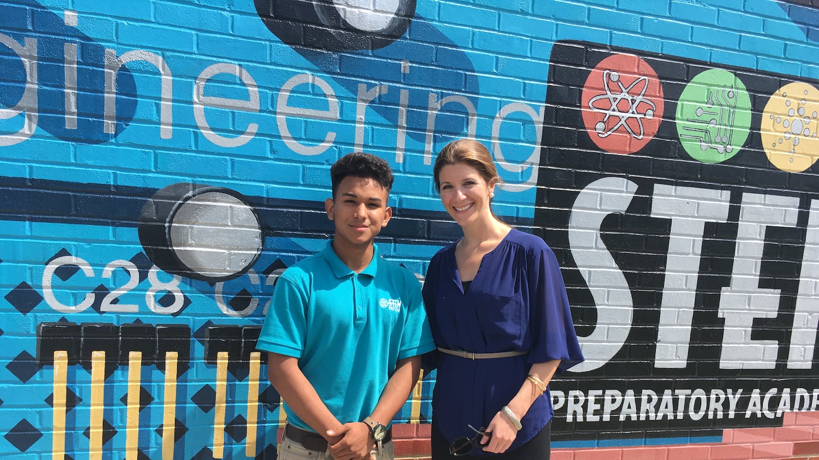 Edgardo, who came to Nashville from Honduras, stands with STEM Prep Middle School principal Kristin McGraner, who was inspired to start a special program for students like Edgardo who are new to speaking English.