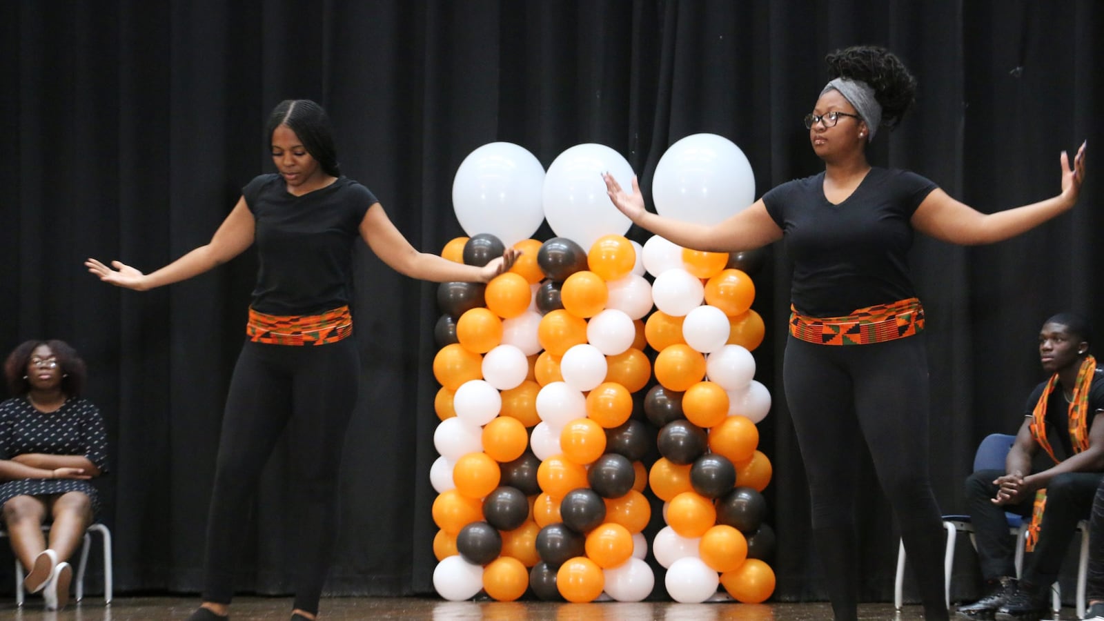 Giamarie Pottinger and Tori Wilson, 11th graders at American History High School, performed during  an event at Weequahic High School responding to the New York Times Magazine's 1619 Project.