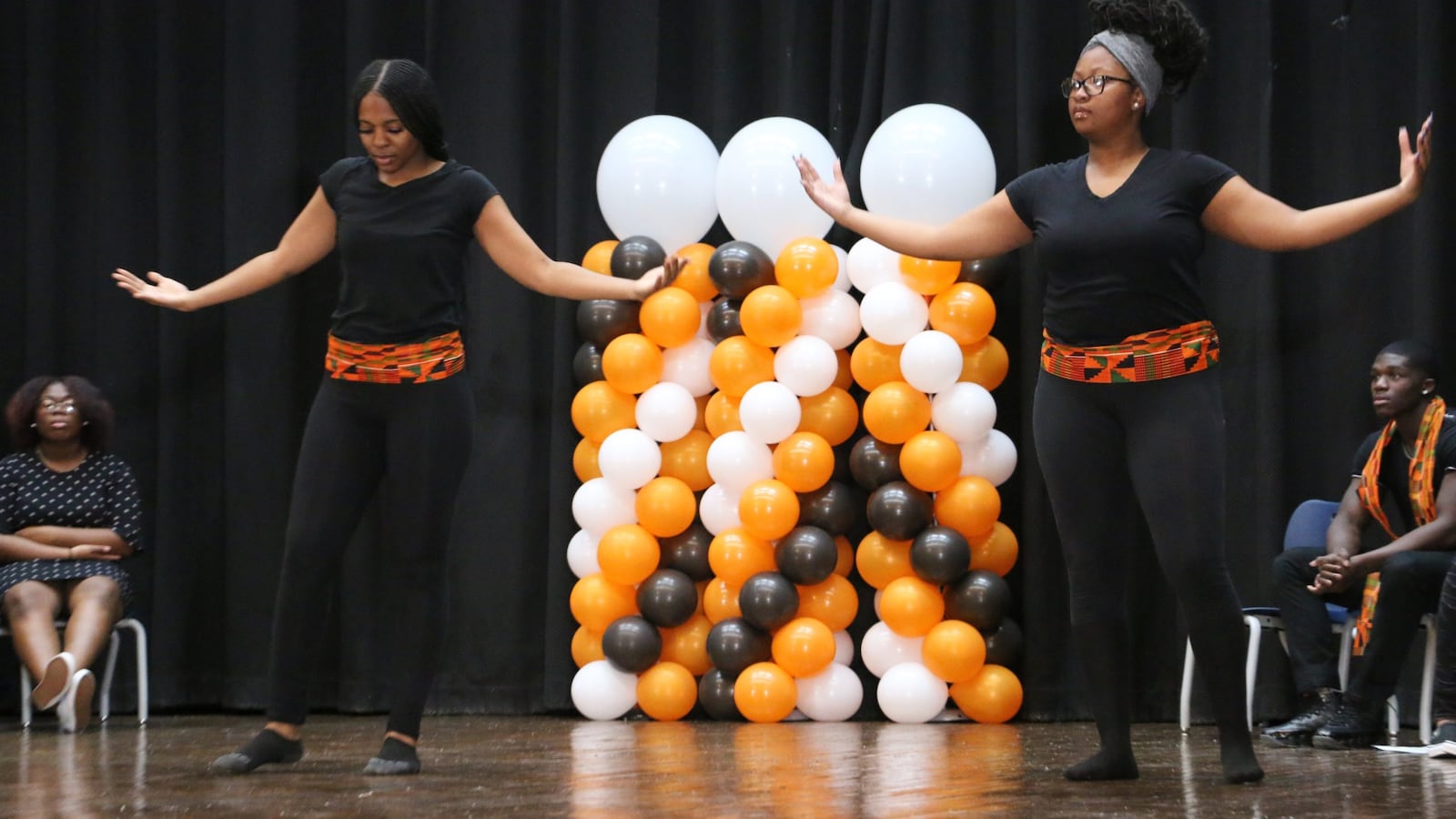 Giamarie Pottinger and Tori Wilson, 11th graders at American History High School, performed during  an event at Weequahic High School responding to the New York Times Magazine's 1619 Project.