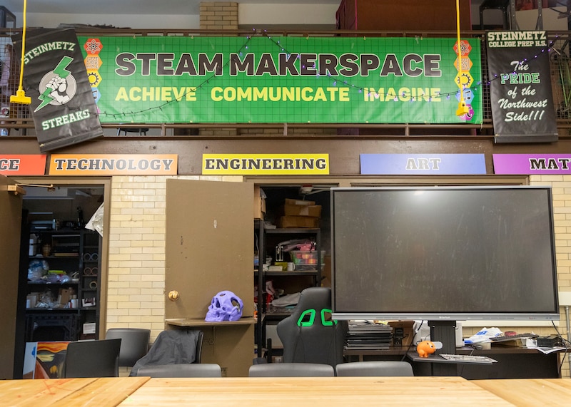 A photograph of a computer lab in a high school room.