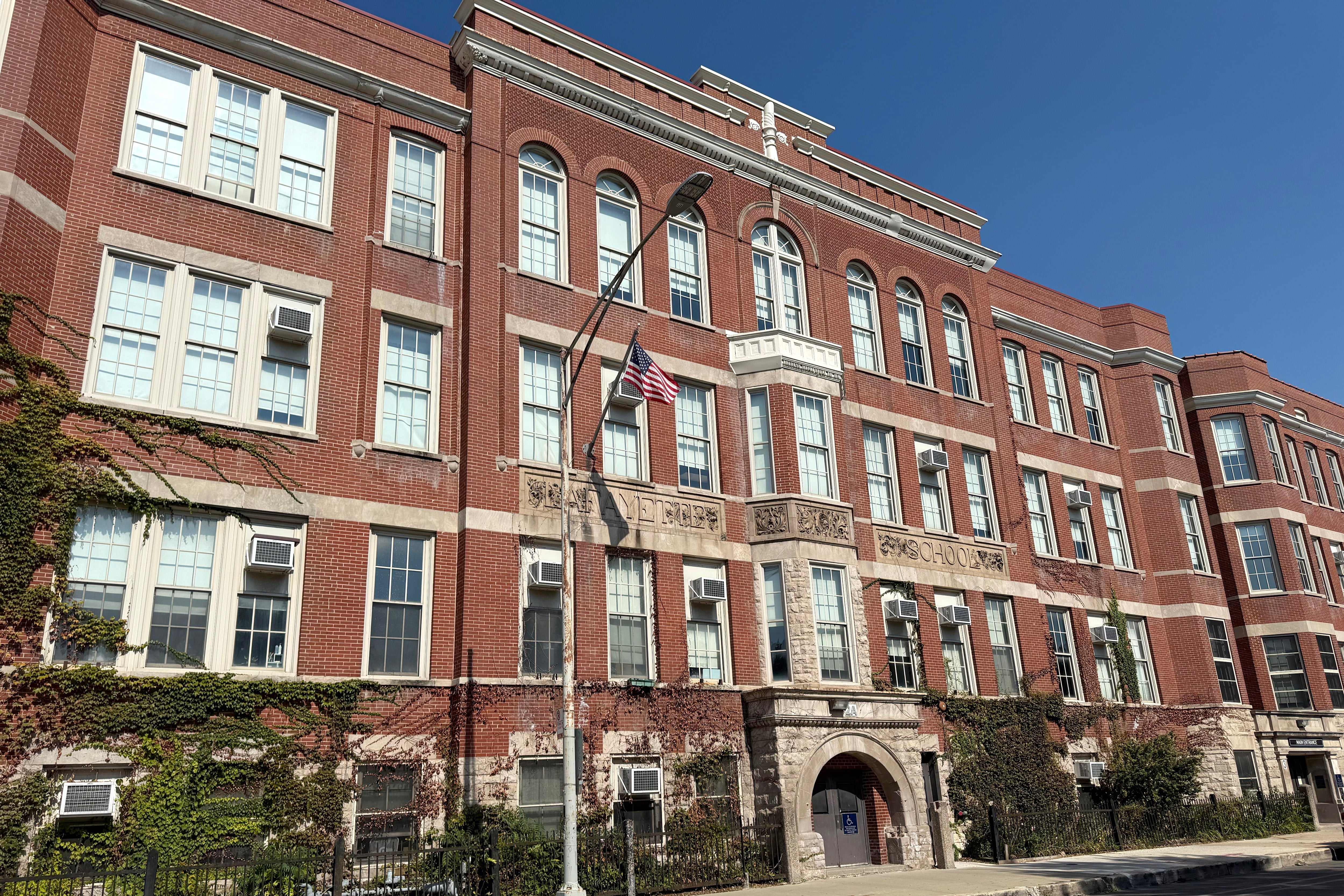 A three-story brick building.