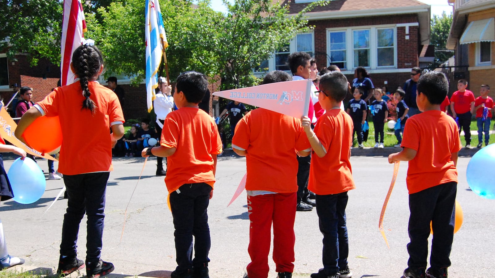 Students at Sandoval elementary take part in College Day, during which students hold a parade and learn about financial aid, in June 2019.