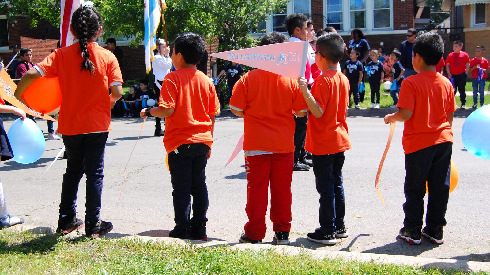 Students at Sandoval elementary take part in College Day, during which students hold a parade and learn about financial aid, in June 2019.