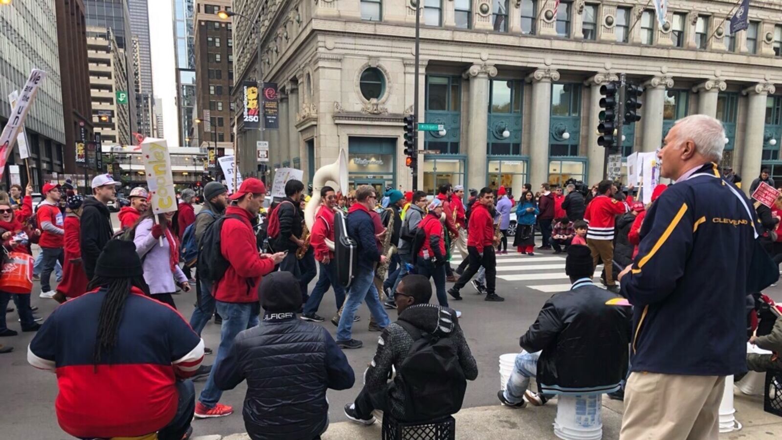 Chicago Teachers Union members and supporters ended the seventh day of their strike with a rally that shut down traffic in parts of downtown Chicago.