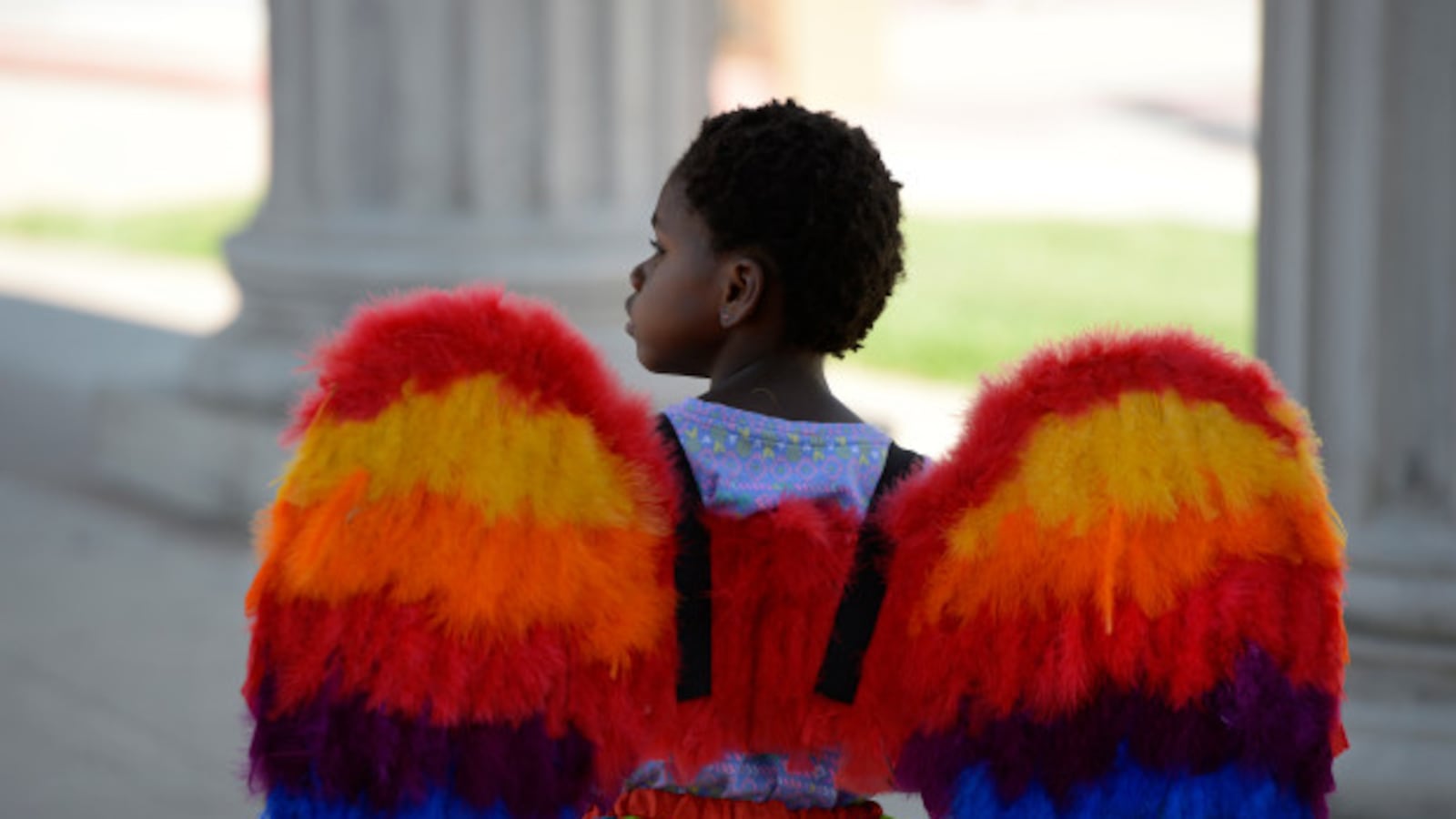 Ellie Ozbayrak, 4, sports rainbow wings at the annual PrideFest celebration at Civic Center Park June 18, 2016.