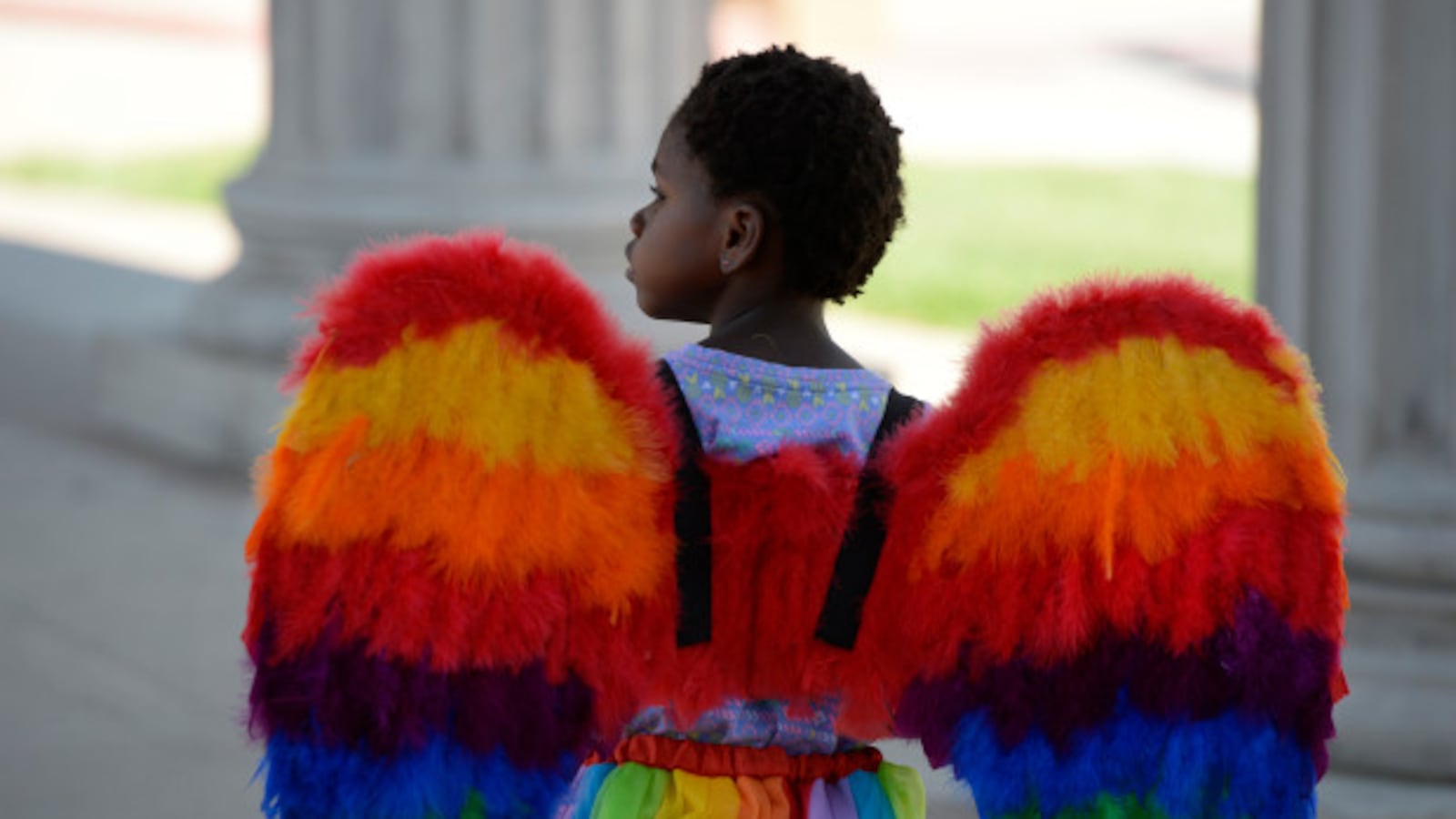 Ellie Ozbayrak, 4, sports rainbow wings at the annual PrideFest celebration at Civic Center Park June 18, 2016.