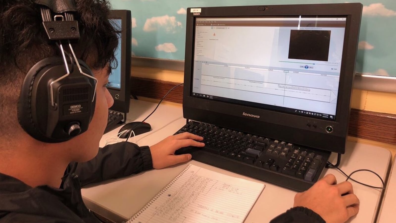 Hancock High School student Andres Cisneros editing an audio segment after school at the Hancock Podcast Club.
