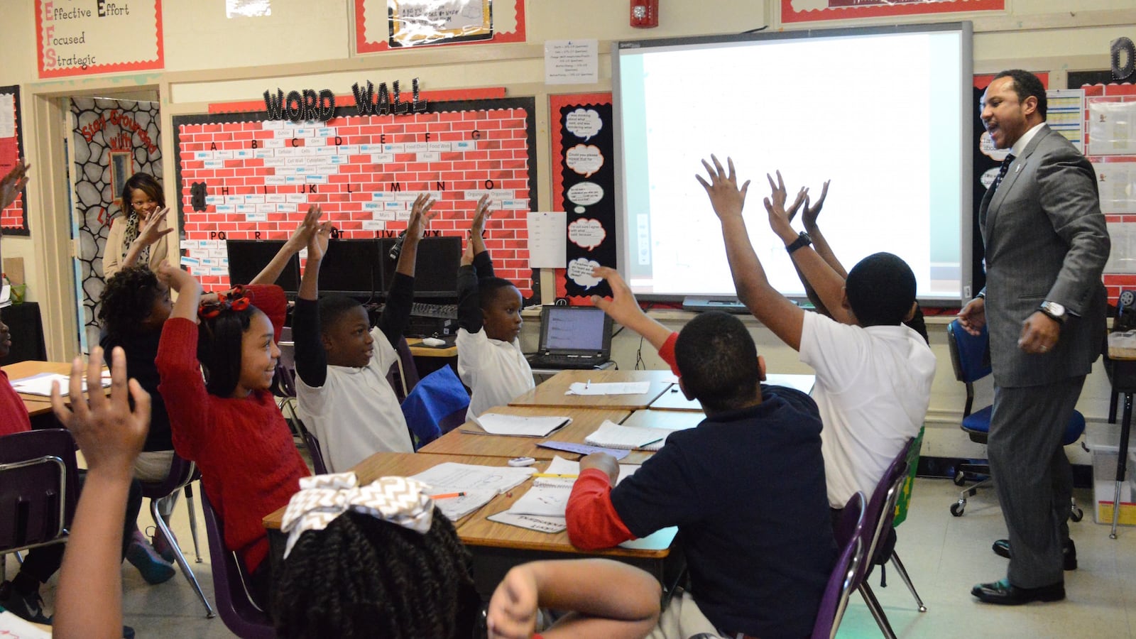 A Memphis teacher engages with his students at Cherokee Elementary School.