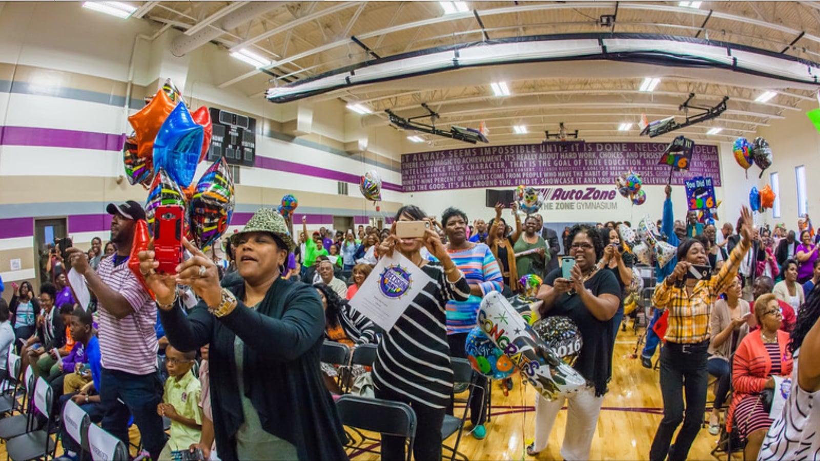 Family members celebrate "Decision Day" at Soulsville Charter School last May when graduating seniors announced their postsecondary pathway.