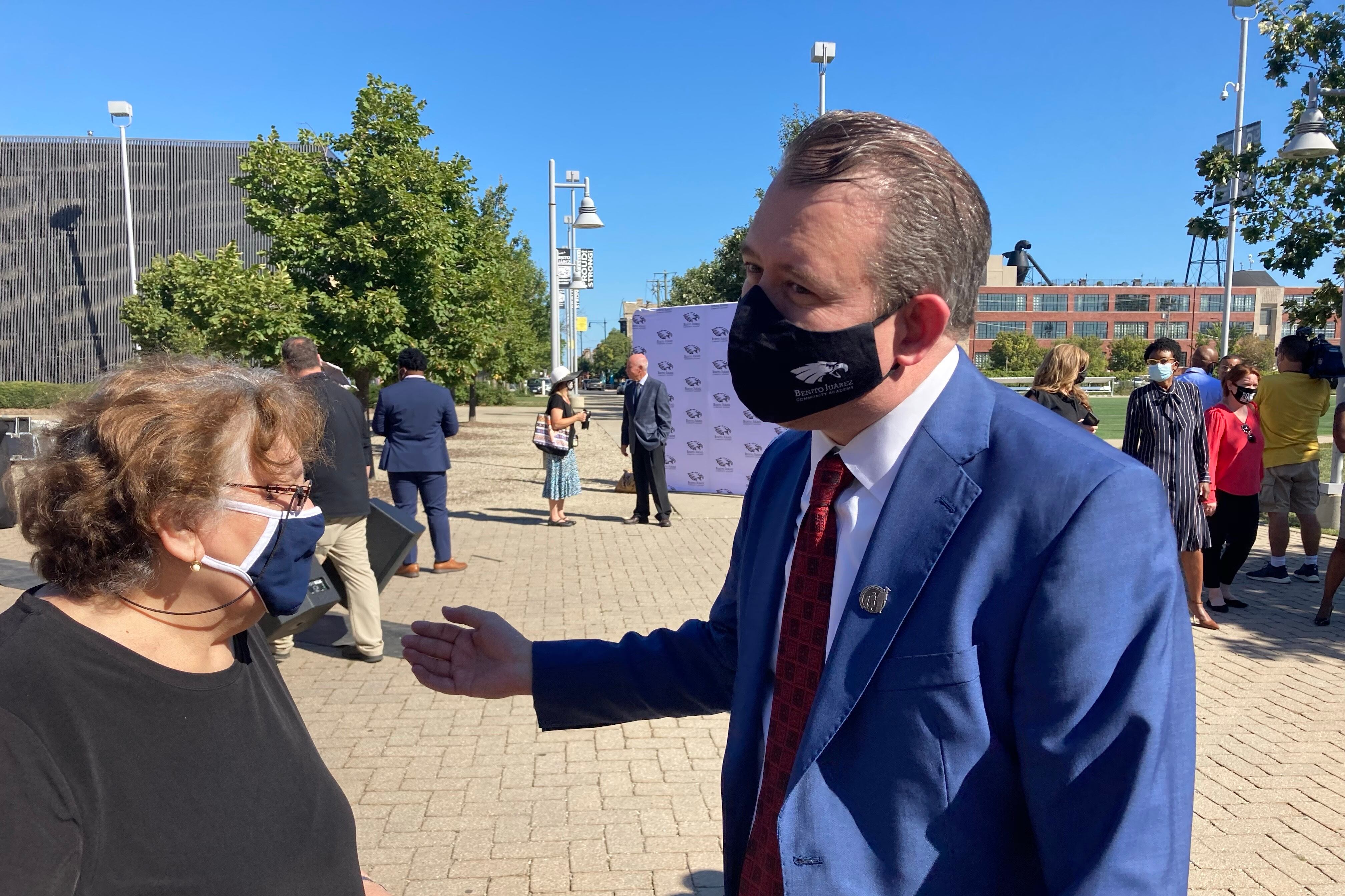 Incoming Chicago Public Schools CEO Pedro Martinez greets his mother after the public announcement of his appointment at Benito Juarez High School.