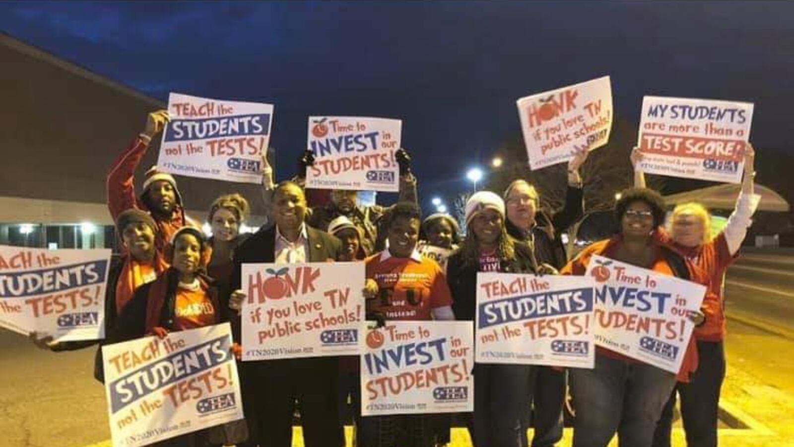 Members and supporters of the United Education Association of Shelby County are joined by interim superintendent Joris Ray in a #RedForEdDay of Action to raise awareness about inequities in public education earlier this month.