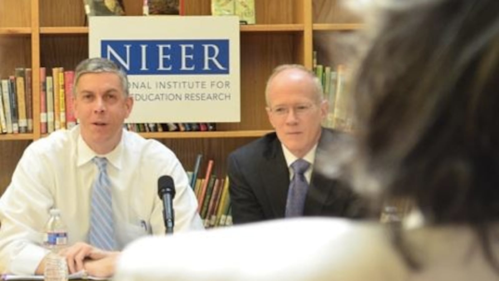 Secretary of Education Arne Duncan and National Institute for Early Education Research Co-Director Steven Barnett talk about early childhood education in Washington, D.C., in 2012. (Mikhail Zinshteyn/Education Writers Association)