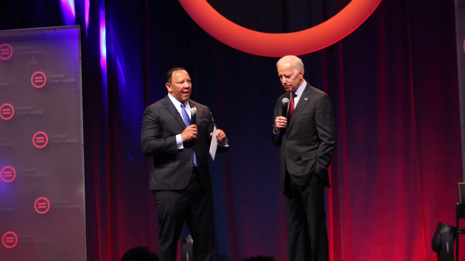 Former vice president Joe Biden speaks with National Urban League President Marc Morial at the organization's conference Thursday in Indianapolis.