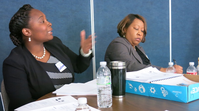 LaDonna Braswell, left, offers feedback on another aspiring principal’s plan.