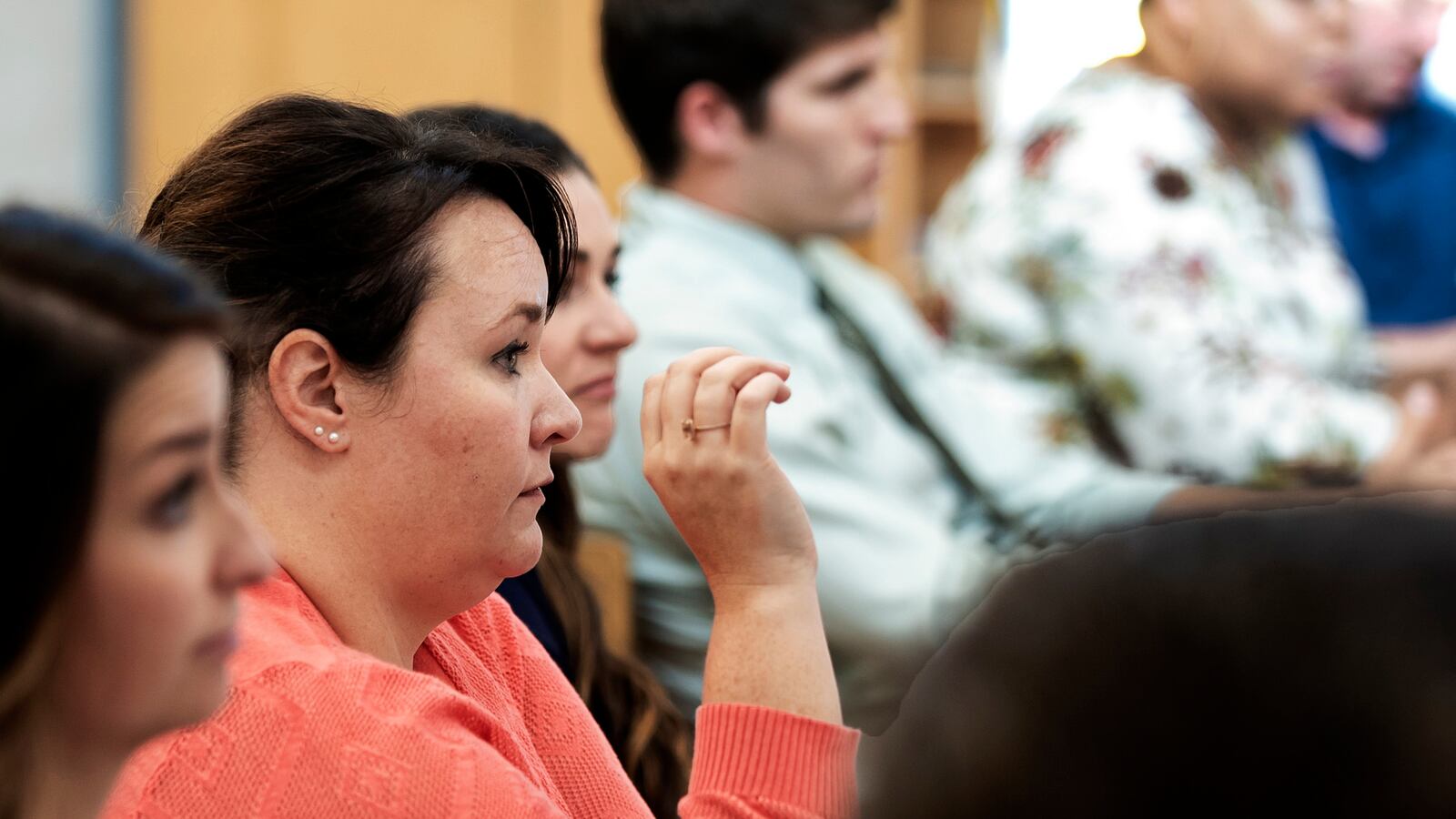 Tara Baker raises her hand to talk during Gov. Bill Haslam’s Sept. 4 roundtable discussion about state testing challenges. An assistant principal at Nashville’s McGavock High School, Baker was among about 150 educators invited to participate. (Photo courtesy of TN.gov)