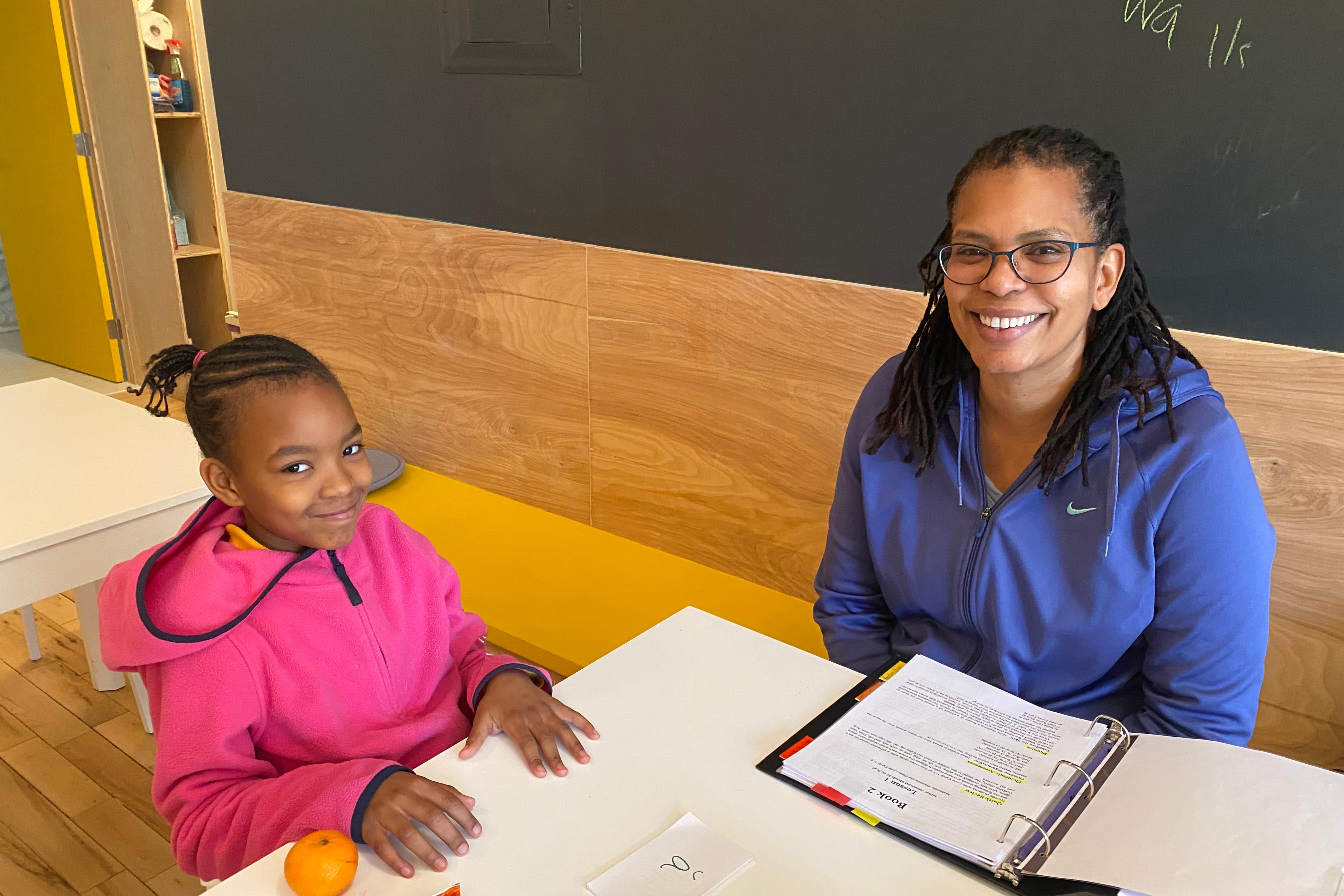 Taylor, a student at Read 718, at a tutoring session with Pam before the pandemic shut the organization’s Downtown Brooklyn and Bedford-Stuyvesant locations. 