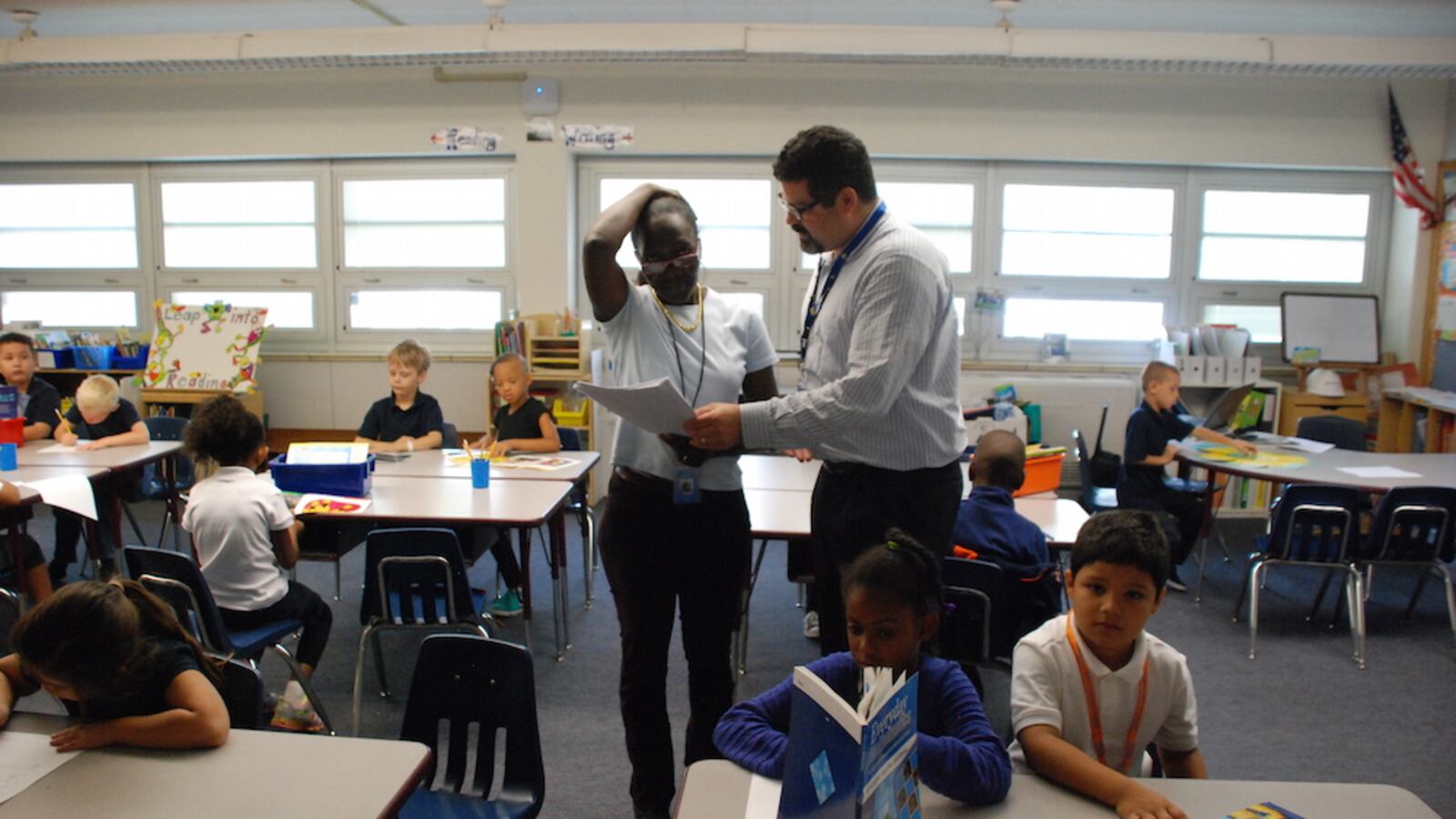 A teacher at Columbine elementary school meets with her principal in the fall of 2014.