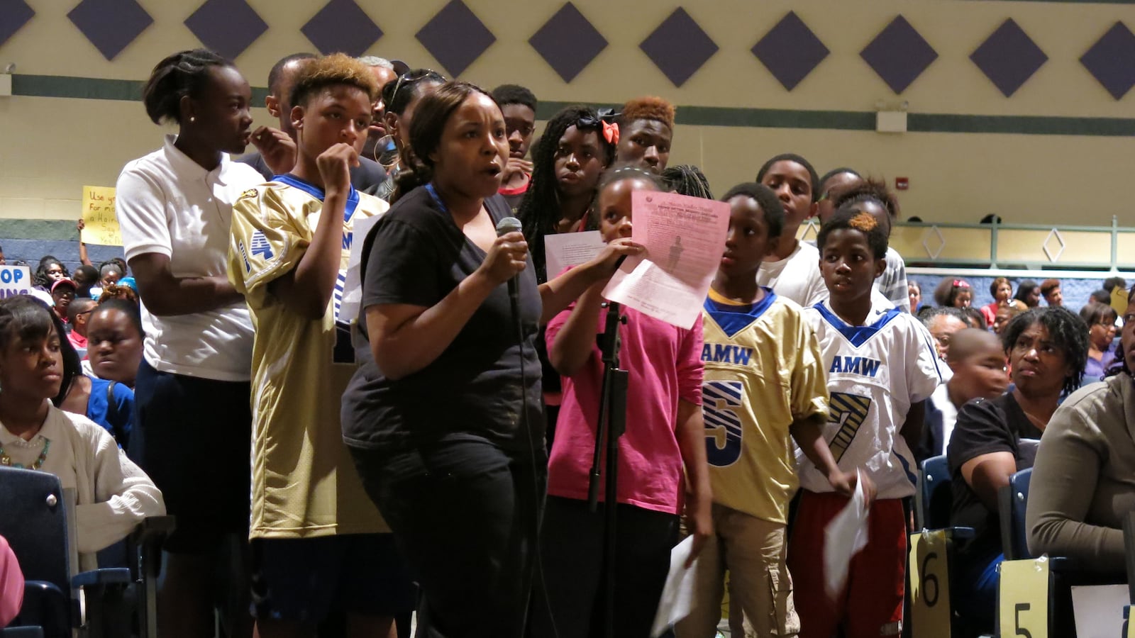 A. Maceo Walker Middle School parent Myra Anderson tells Yes Prep, "This is not a partnership, we don't want any part of this," during Wednesday's community meeting regarding the school takeover process.