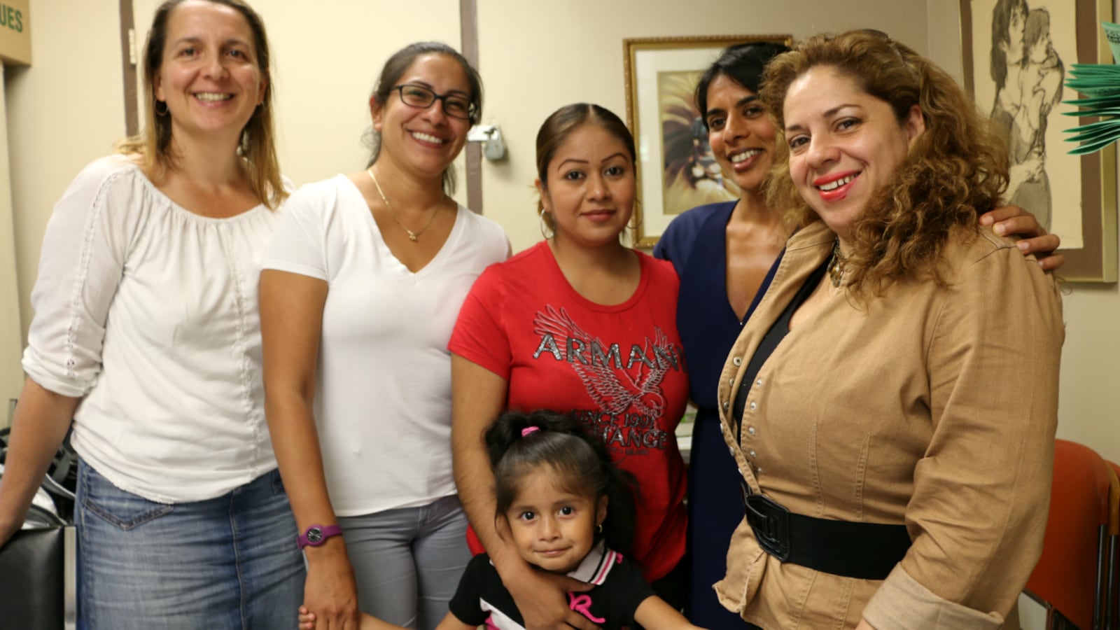 Members of the District 3 Equity in Education Task Force and the Parent Leadership Project. From left: Lori Falchi, Flor Donoso, Claudia Ortega and her daughter Sophia, Ujju Aggarwal, and Mariela Angulo.