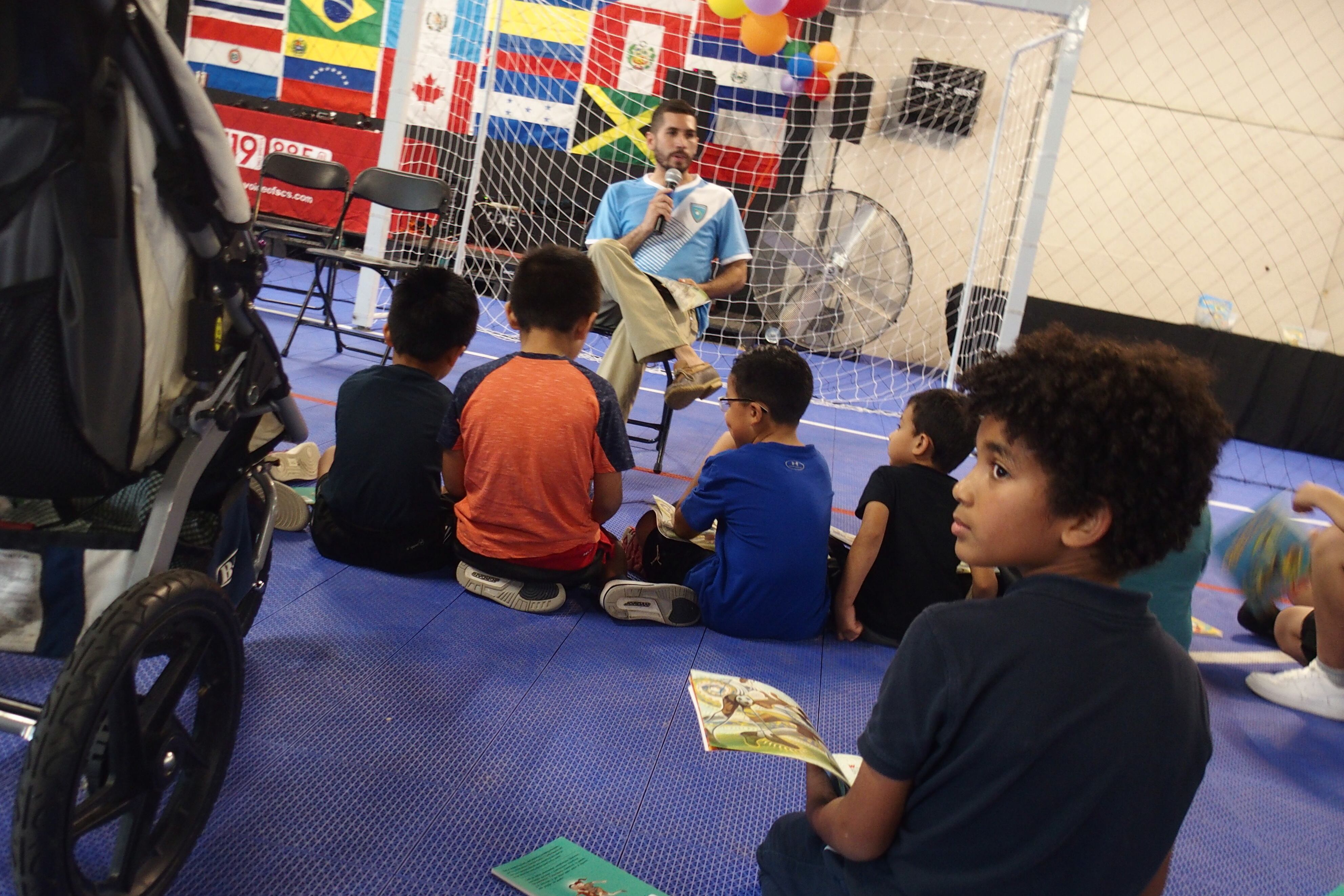 Students listen to a member of the Memphis 901 FC during a Shelby County Schools Hispanic Heritage Month reading event in 2019.