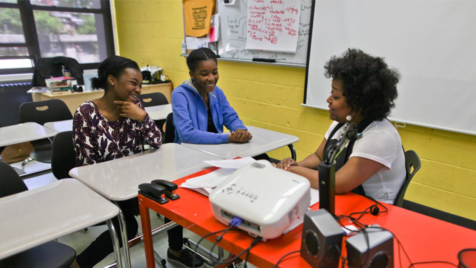 EDesign Lab members brainstorm ideas in group meeting. (Courtesy of Hsing Wei)