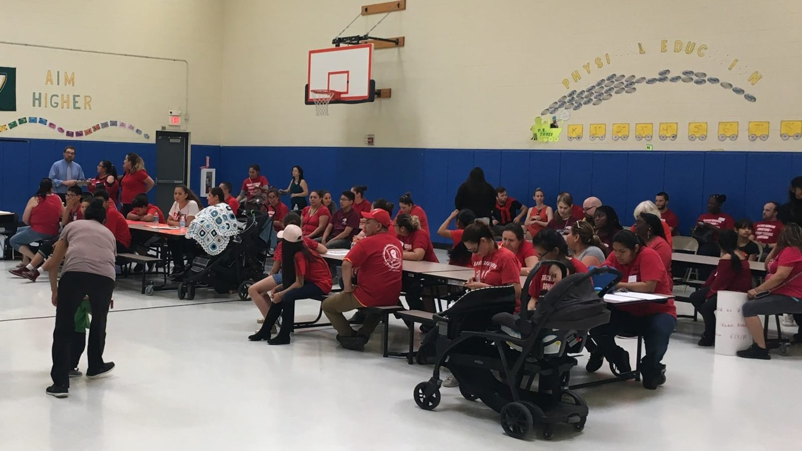 Parents filled the gym at Southwest Detroit Community School last month to protest administrator turnover and demand a new contract for teachers.