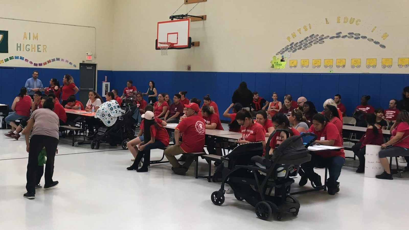 Parents filled the gym at Southwest Detroit Community School last month to protest administrator turnover and demand a new contract for teachers.