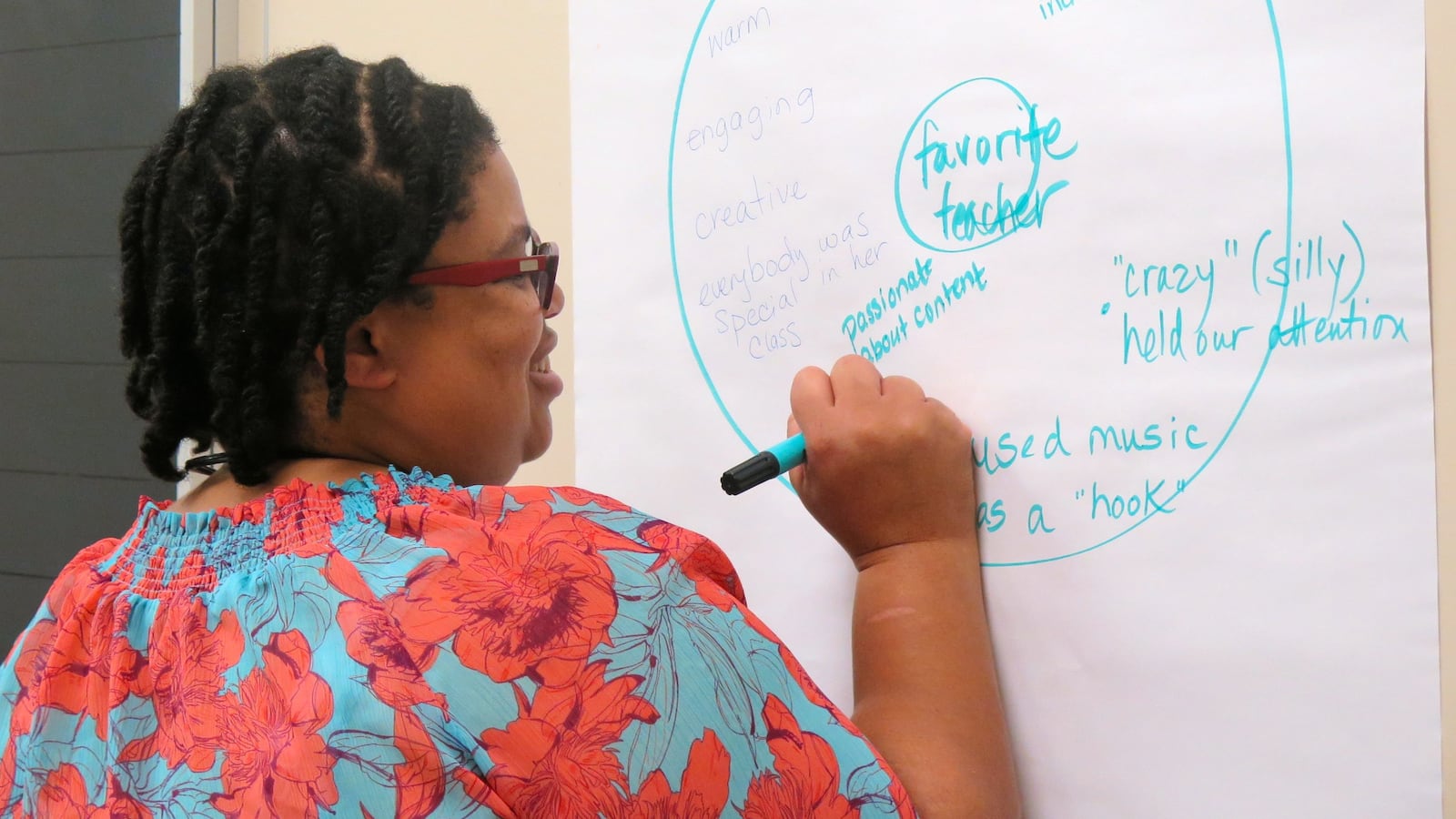 An elementary school teacher at one of Indianapolis Public Schools' priority schools describes the qualities of her favorite teacher during the 2014 Priority Schools Summer Institute.