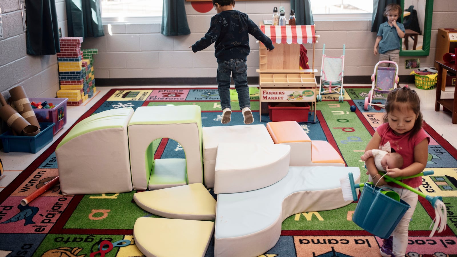 Preschool children are seen playing in a classroom during a recent morning session at Su Casa Ministries in Memphis.