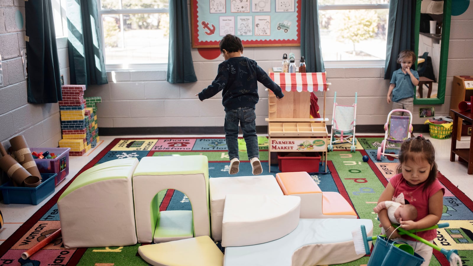 Preschool children are seen playing in a classroom during a recent morning session at Su Casa Ministries in Memphis.