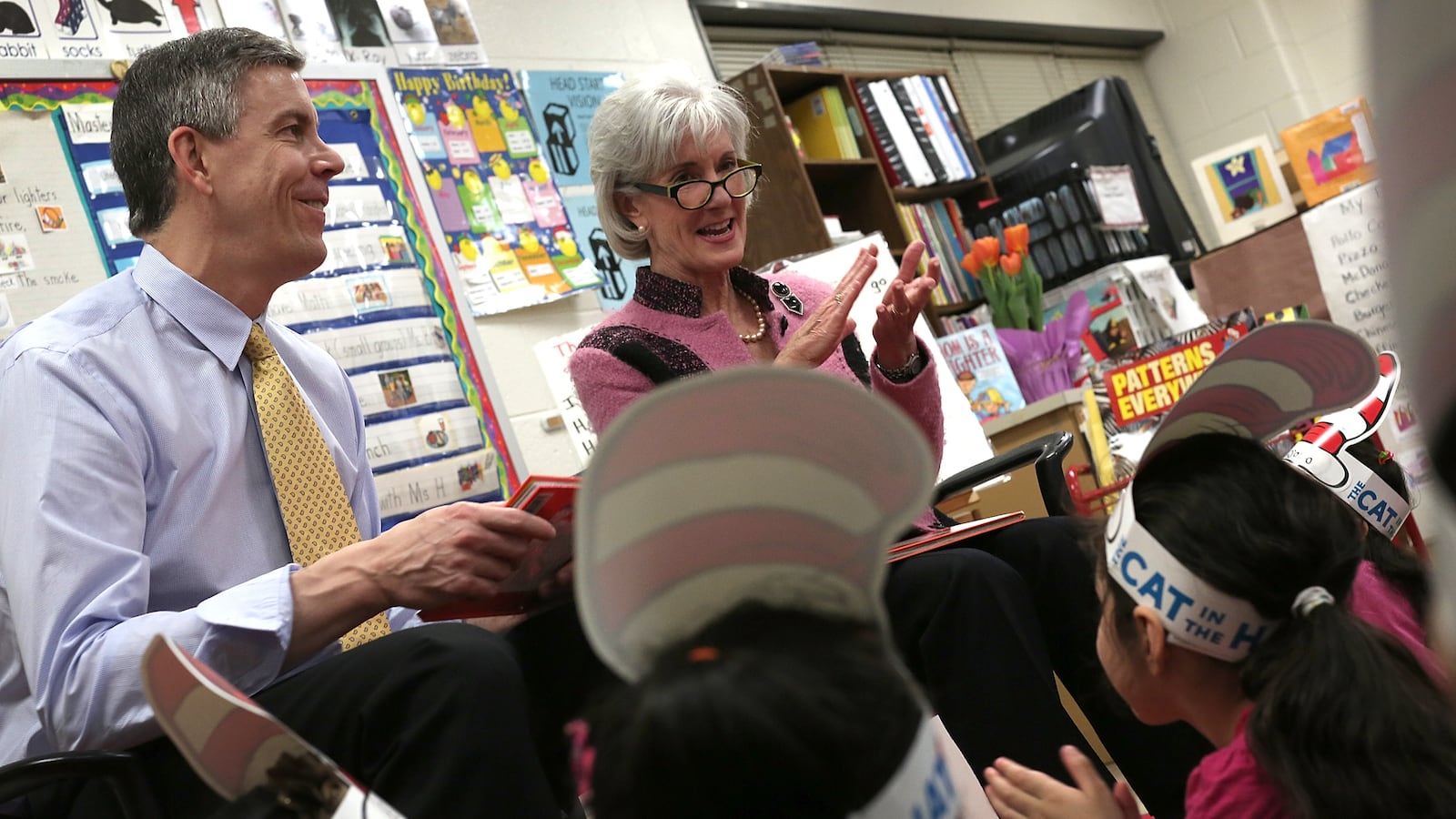 Education Secretary Arne Duncan and HHS Secretary Kathleen Sebelius read to students enrolled in a Head Start program at Rolling Terrace Elementary School March 1, 2013 in Takoma Park, Maryland. (Photo by Win McNamee/Getty Images)