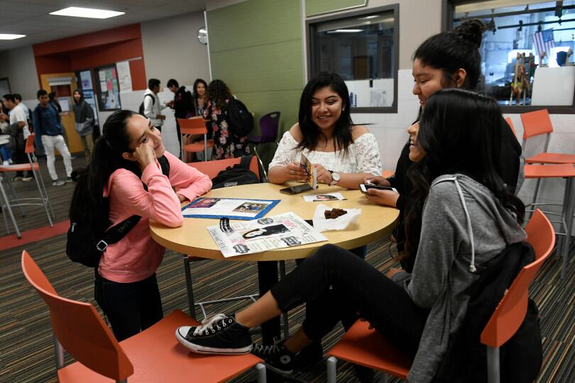 Students hang out in between classes at Academy High School on May 10, 2018 in the Mapleton district.